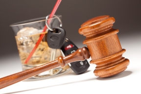 Gavel, Alcoholic Drink &amp; Car Keys on a Gradated Background - Drinking and Driving Concept.